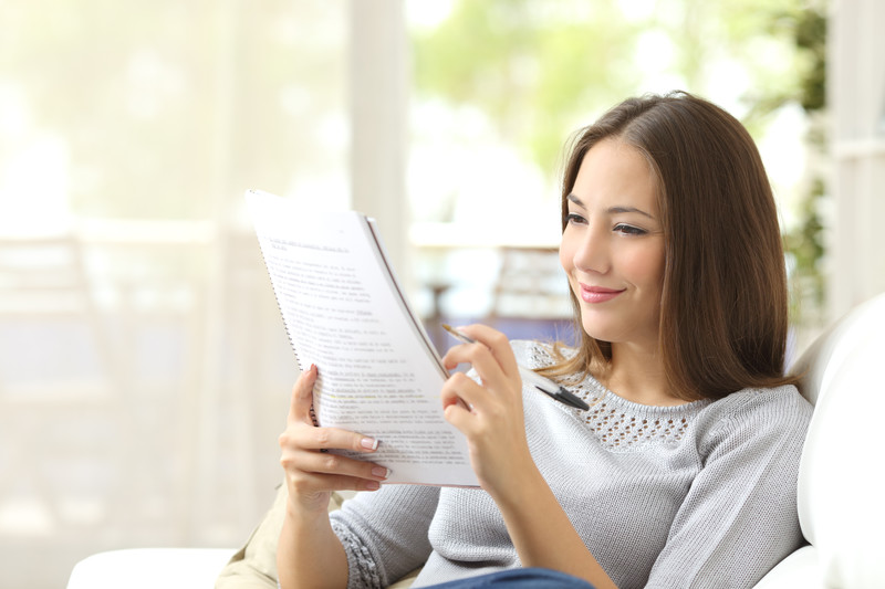 Miami home inspections a woman calculating home budget