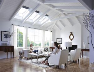 Home Inspectors Miami a living room area with white wall color and a skylight