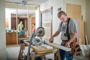 Miami Home Inspectors man preparing materials for home remodeling